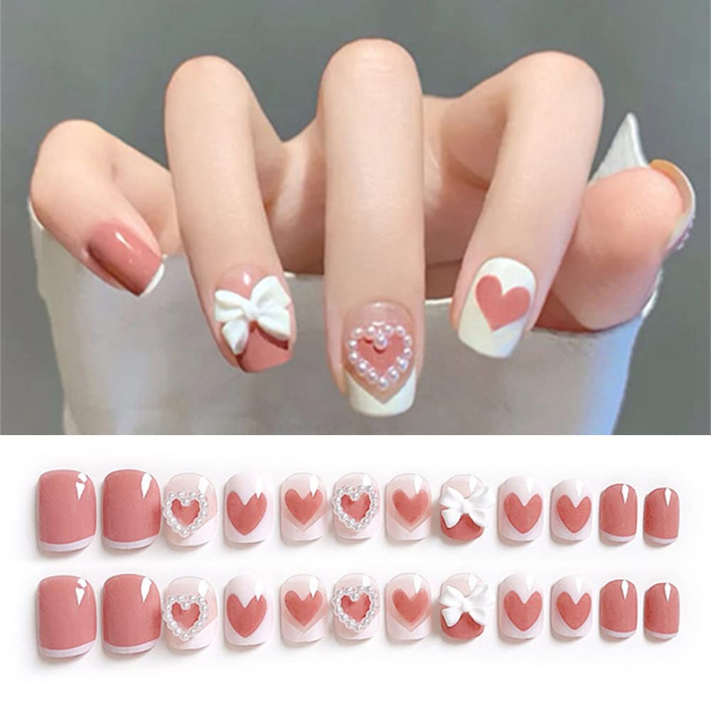  white heart french tip nails; light color nail designs coffin nails; nude nails; almond nail designs; almond nails; Heart nail designs 2022; Nails with heart design; Short heart nails; Heart nails with eyes; Y2K heart nails; Heart nails pinterest; Simple heart nail designs;
